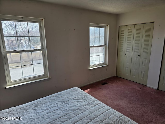 29 Burnett Way, Washingtonville, NY 10992 - unfurnished bedroom with a closet, carpet flooring, baseboards, and visible vents