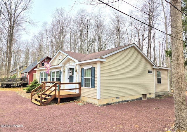 127 Maxatawny Dr, Pocono Lake, PA 18347 - view of front of property featuring a wooden deck and crawl space