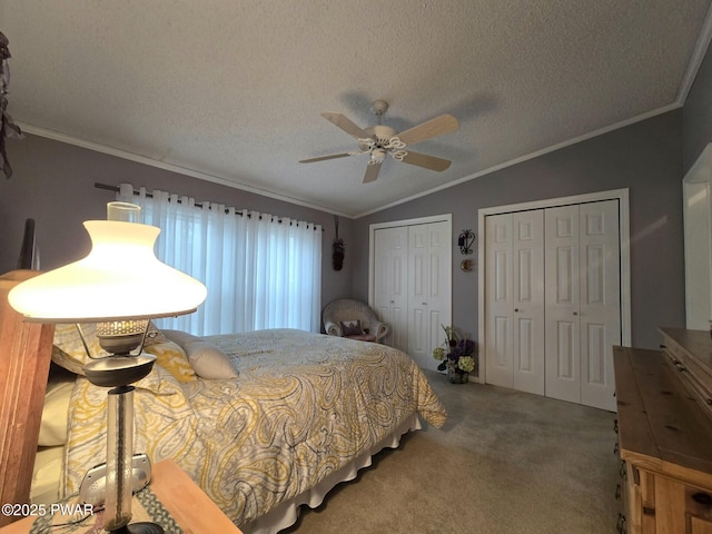 127 Maxatawny Dr, Pocono Lake, PA 18347 - carpeted bedroom featuring vaulted ceiling, multiple closets, crown molding, a textured ceiling, and ceiling fan