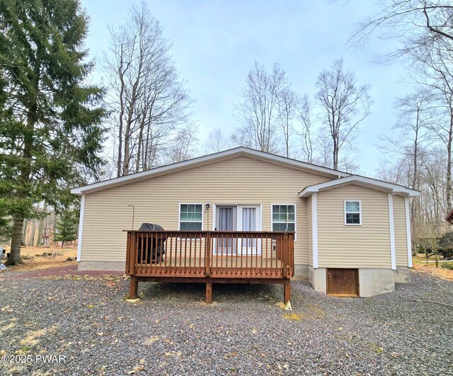 127 Maxatawny Dr, Pocono Lake, PA 18347 - back of house with a wooden deck