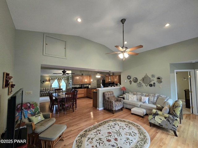 127 Maxatawny Dr, Pocono Lake, PA 18347 - living room with ceiling fan, light wood-style floors, high vaulted ceiling, and recessed lighting