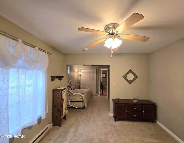 127 Maxatawny Dr, Pocono Lake, PA 18347 - bedroom featuring light carpet, a ceiling fan, and a baseboard heating unit
