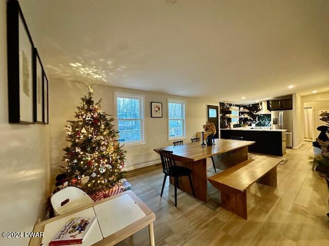 dining room with light wood-type flooring