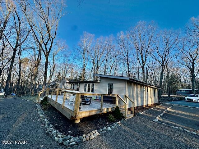 view of front of house featuring a deck