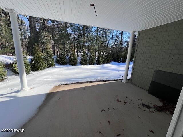 view of yard layered in snow