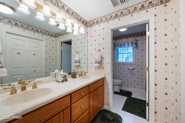 121 Island View Dr, Lake Ariel, PA 18436 - full bathroom featuring wallpapered walls, toilet, and double vanity