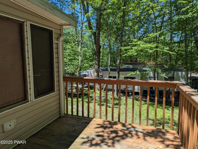 150 Shohola Pkwy N, Shohola, PA 18458 - wooden deck with a lawn