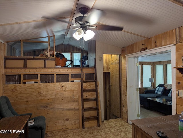 150 Shohola Pkwy N, Shohola, PA 18458 - bedroom with wood walls, vaulted ceiling, and light flooring