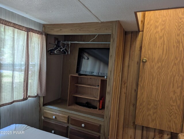 150 Shohola Pkwy N, Shohola, PA 18458 - bedroom view of a textured ceiling and wooden walls