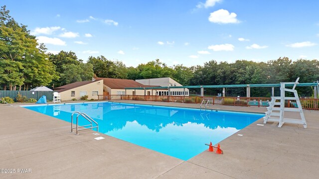 150 Shohola Pkwy N, Shohola, PA 18458 - community pool featuring a patio and view of scattered trees