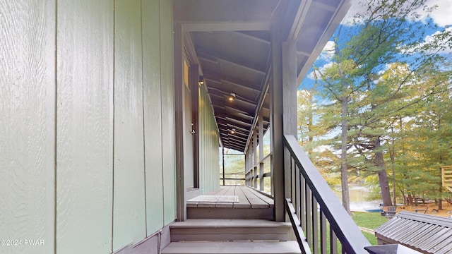 staircase featuring a water view