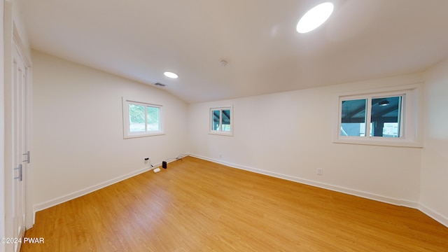 spare room featuring light hardwood / wood-style floors