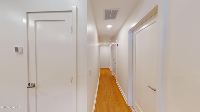 corridor featuring light wood-type flooring