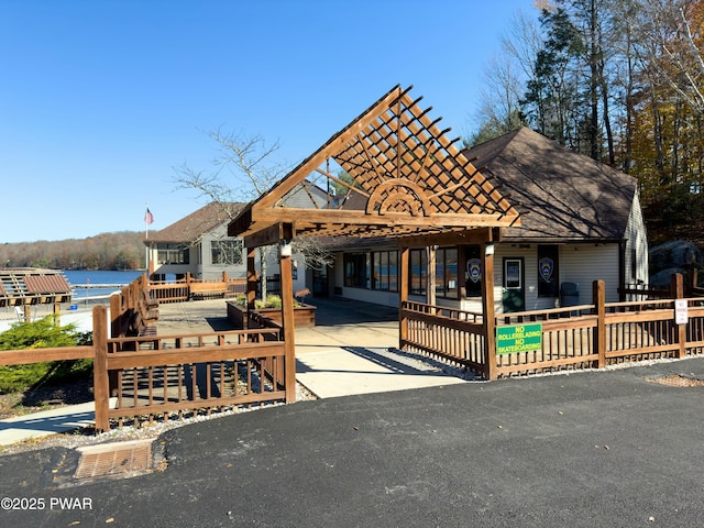 exterior space with a water view