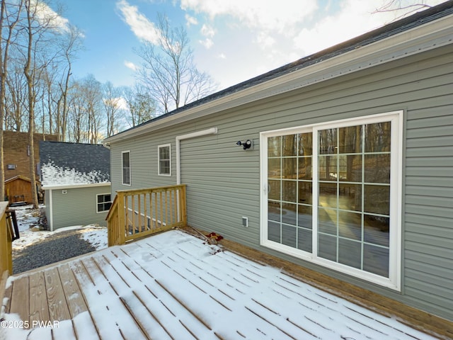 view of snow covered deck