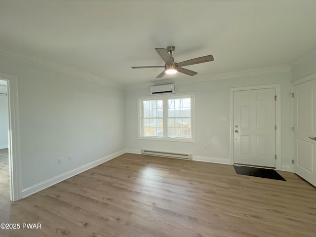 empty room featuring crown molding, light hardwood / wood-style floors, a wall mounted air conditioner, a baseboard heating unit, and ceiling fan