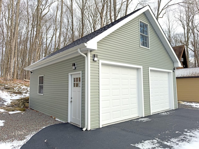 view of snow covered garage