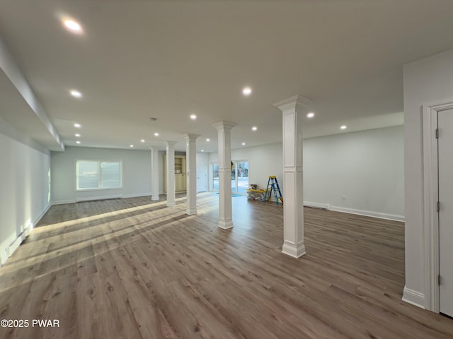 basement featuring hardwood / wood-style floors