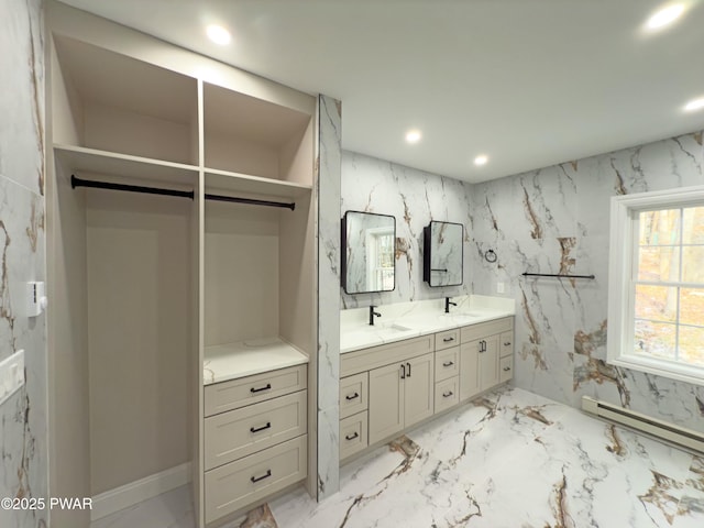 bathroom with a baseboard radiator and vanity