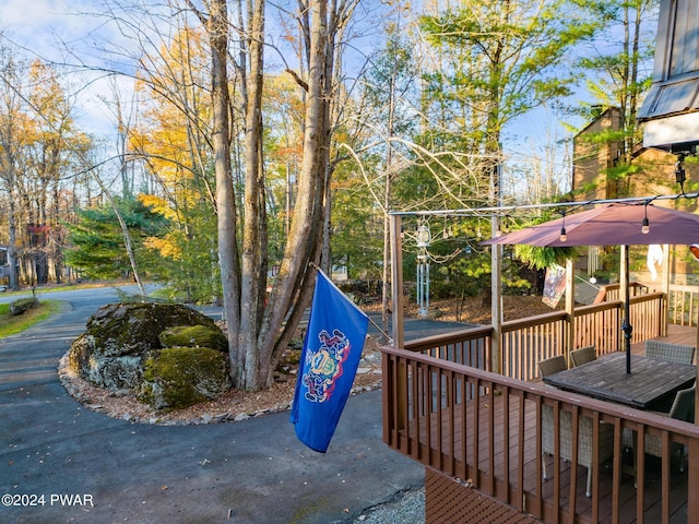 view of playground with a deck