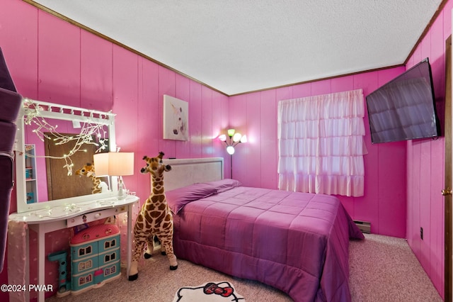 bedroom featuring light colored carpet, a textured ceiling, wooden walls, and a baseboard radiator