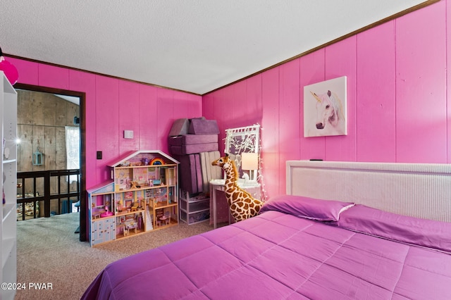 carpeted bedroom featuring a textured ceiling