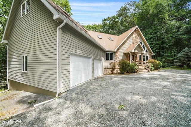 view of home's exterior with a garage