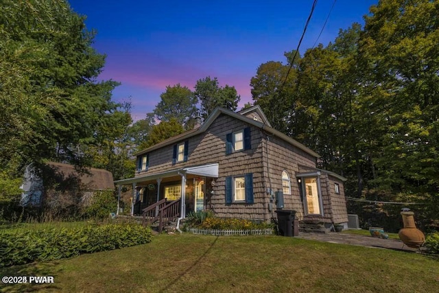 log-style house with a yard