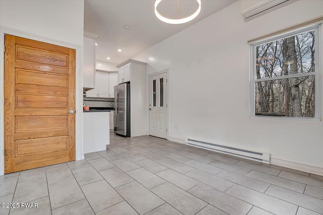 interior space featuring recessed lighting, a baseboard radiator, an AC wall unit, and light tile patterned flooring