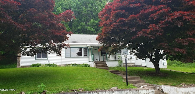 3307 Creamton Dr, Preston Park, PA 18455 - obstructed view of property featuring a front yard and a porch