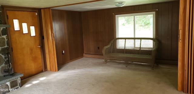 3307 Creamton Dr, Preston Park, PA 18455 - unfurnished room featuring a baseboard radiator, carpet flooring, and wood walls