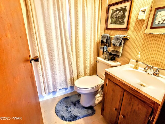 130 Willow Dr, Lords Valley, PA 18428 - full bathroom featuring vanity, tile patterned floors, toilet, wallpapered walls, and a shower with shower curtain