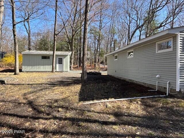 133 Arrowood Dr, Dingmans Ferry, PA 18328 - view of yard with an outbuilding