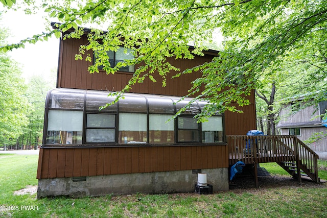 16 Par Ct, Lake Ariel, PA 18436 - back of property with a wooden deck, crawl space, and stairway