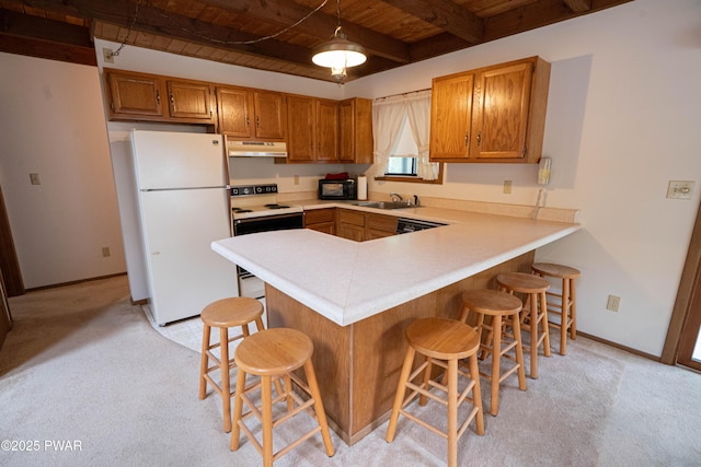 16 Par Ct, Lake Ariel, PA 18436 - kitchen with black appliances, wood ceiling with exposed beams, a peninsula, brown cabinets, and under cabinet range hood