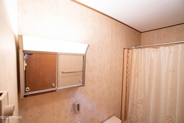 16 Par Ct, Lake Ariel, PA 18436 - bathroom featuring crown molding, toilet, and curtained shower