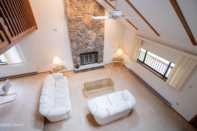 16 Par Ct, Lake Ariel, PA 18436 - carpeted living room featuring baseboard heating, a fireplace, and a ceiling fan