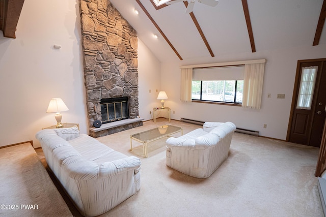 16 Par Ct, Lake Ariel, PA 18436 - living area with a ceiling fan, light carpet, beam ceiling, a stone fireplace, and baseboard heating