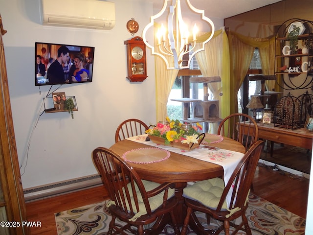 dining area featuring an AC wall unit, hardwood / wood-style floors, a baseboard heating unit, and an inviting chandelier