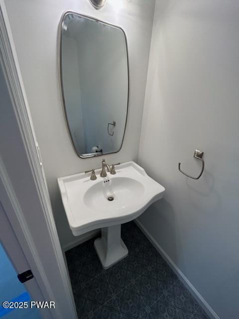 104 Maple Park Dr, Shohola, PA 18458 - bathroom featuring baseboards