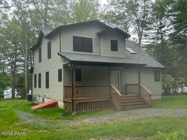 104 Maple Park Dr, Shohola, PA 18458 - view of front facade featuring roof with shingles and a porch