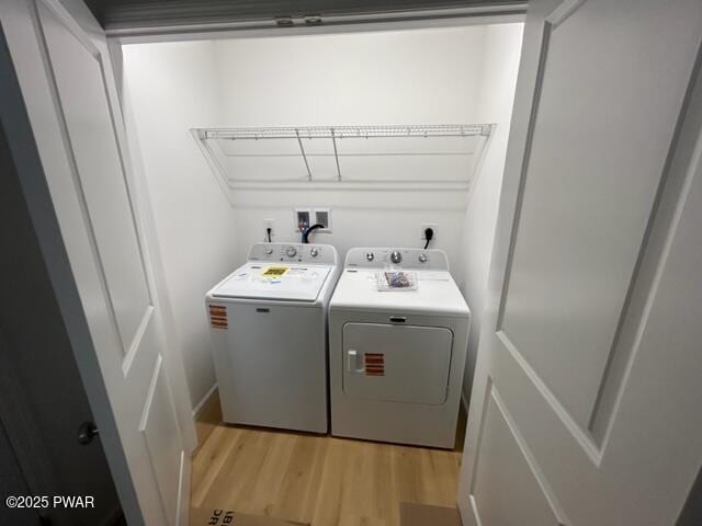 104 Maple Park Dr, Shohola, PA 18458 - washroom featuring independent washer and dryer and light wood finished floors