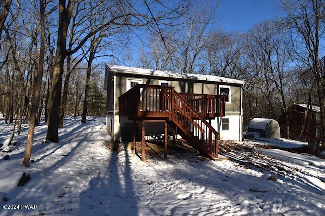 view of front of home featuring a wooden deck