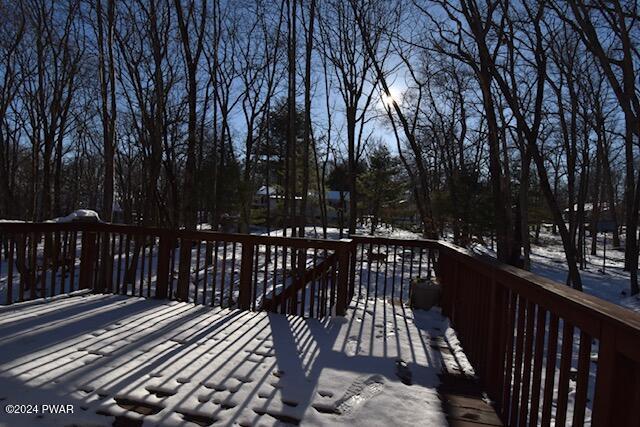 view of snow covered deck