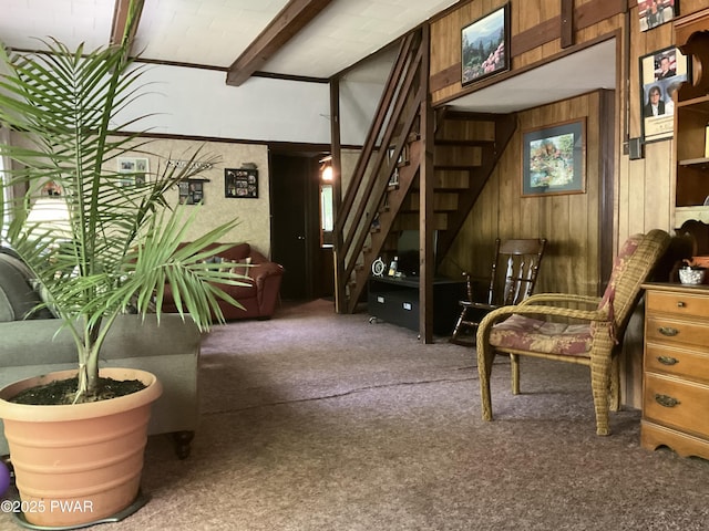 124 Roundhill Rd, Dingmans Ferry, PA 18328 - living area featuring stairway, wooden walls, carpet flooring, and beam ceiling