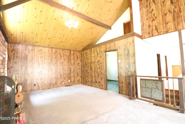 44 Purdytown Tpke, Lake Ariel, PA 18436 - unfurnished living room featuring carpet floors, wood walls, a wood ceiling with exposed beams, a chandelier, and high vaulted ceiling