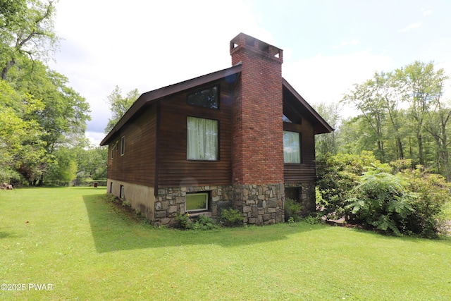 44 Purdytown Tpke, Lake Ariel, PA 18436 - view of side of home with a chimney, a yard, and stone siding
