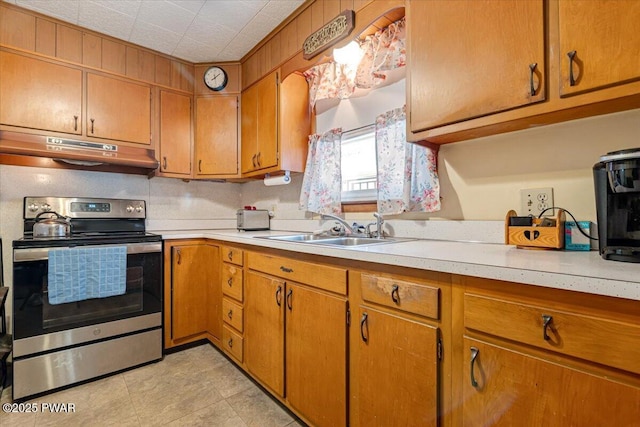 kitchen featuring sink and stainless steel electric range