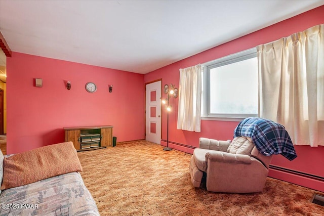 living room featuring a baseboard heating unit and carpet flooring