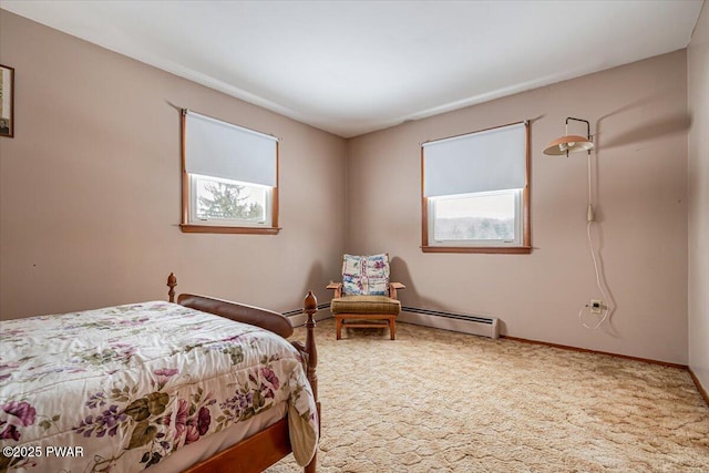 bedroom featuring carpet floors and baseboard heating